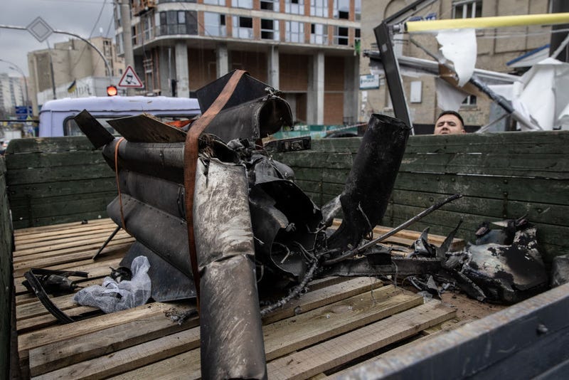 The remains of a rocket as it is cleared away on the back of a truck on February 24, 2022 in Kyiv, Ukraine