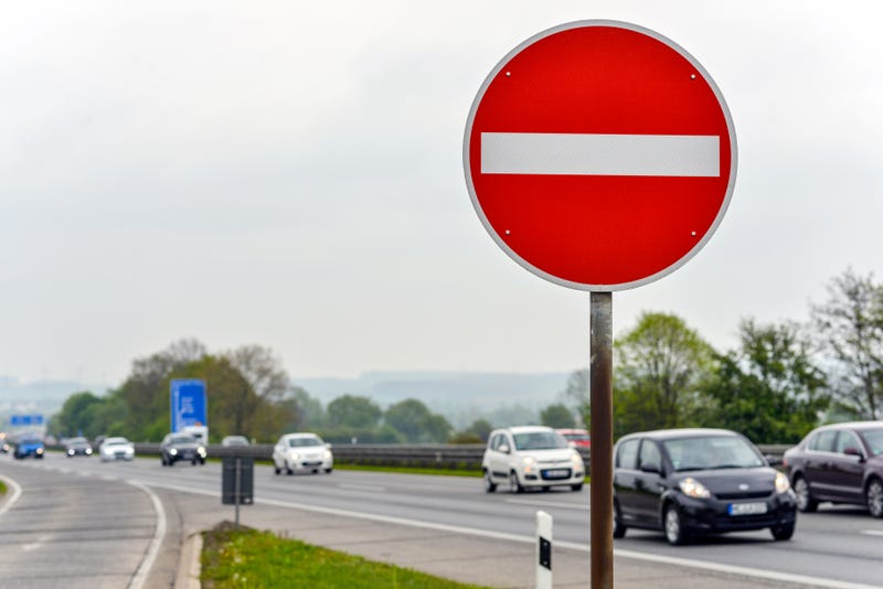 wrong way highway exit sign