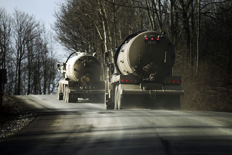 Trucks with the natural gas industry, some of the thousands that pass through the area daily, drive through the countryside on January 18, 2012 in Springville, Pennsylvania.