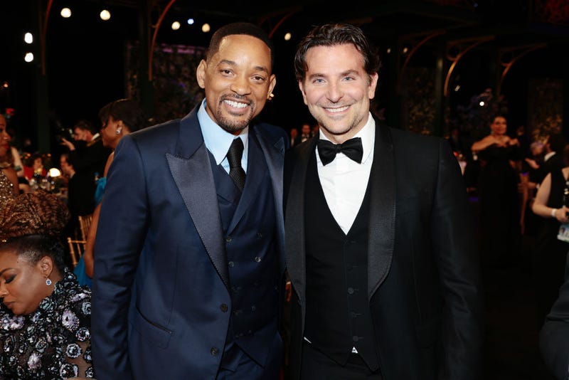 Will Smith and Bradley Cooper pose during the 28th Screen Actors Guild Awards at Barker Hangar on February 27, 2022 in Santa Monica, California.