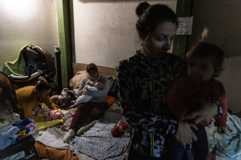 Mothers tend to their babies that are under medical treatment in the bomb shelter of the paediatric ward of Okhmatdyt Children's Hospital on February 28, 2022 in Kyiv, Ukraine. As Russia’s large-scale invasion of Ukraine entered its fifth day, the capital was quieter overnight but Russian forces continued to mass outside the city. Ukrainian forces waged battle to hold other major cities. (Photo by Chris McGrath/Getty Images)