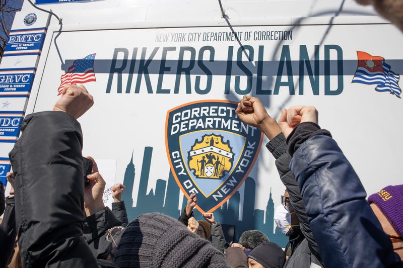 Criminal justice activists demand that Rikers Island jail and the system that discriminates against the poor by demanding bail before trial end, on February 28, 2022 at the gate to Rikers Island in Queens, New York. 
