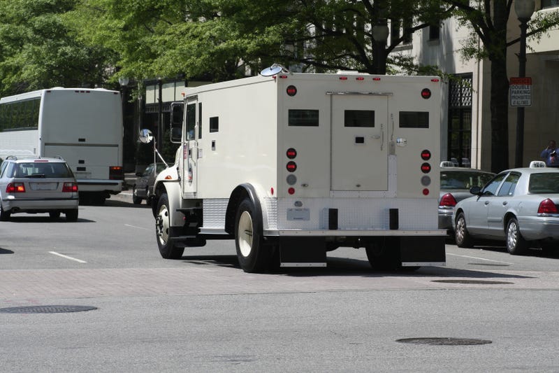 Armored truck in traffic. 