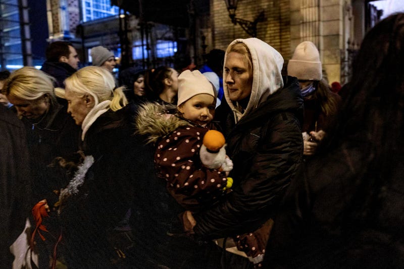 People arrive to the Western Railway Station from Zahony after crossing the border at Zahony-Csap as they flee Ukraine on March 03, 2022 in Budapest, Hungary.