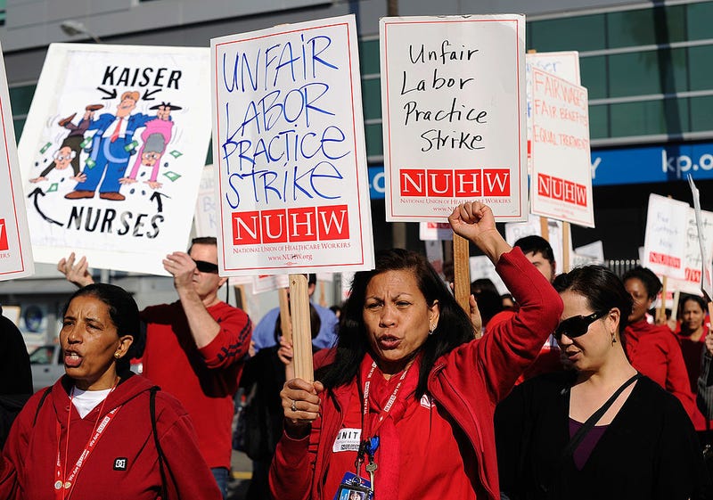 Unionized nurses and healthcare workers from the Kaiser Permanente Los Angeles Medical Center take part in a 24-hour strike on January 31, 2012, in Los Angeles.