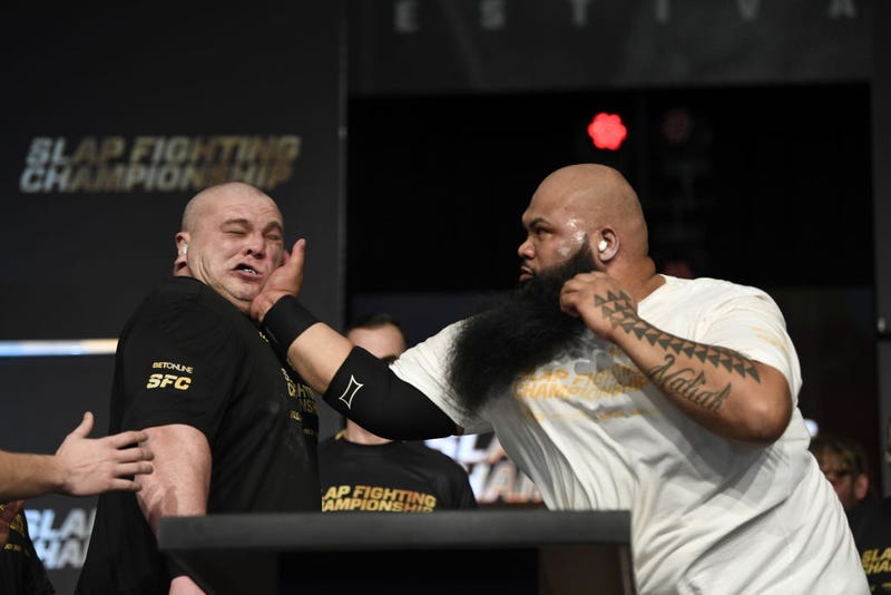 Koa “Da Crazy Hawaiian” Viernes slaps Dawid “Zaleś” Zalewski in the super heavyweight bout at the Arnold Sports Festival in Columbus Convention Center