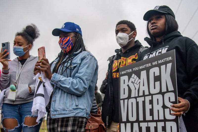  I'munique, 18, (R), listens during the Black Voters Matter's 57th Selma to Montgomery March at the Wright Chapel AME Church on March 09, 2022 in Selma, Alabama. People gathered alongside organizations including Black Voters Matter, Rainbow PUSH Coalition, and the Transformative Justice Network to march the 11-mile original route that the late U.S. Rep. John Lewis and other civil rights leaders marched on March 7, 1965. In 1965, the march began at the the Edmund Pettus Bridge and was met with brutal beatings of civil rights marchers at the hands of law enforcement. The march would later become known as "Bloody Sunday". The televised attacks were seen all over the nation, prompting public support for the civil rights activists in Selma and for the voting rights campaign. (Photo by Brandon Bell/Getty Images)