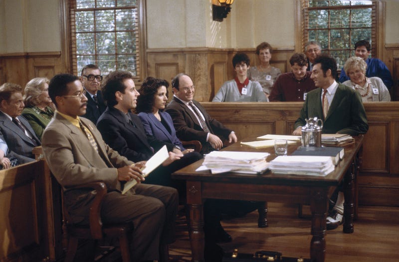 SEINFELD -- "The Finale: Part 1 & 2" Episode 23/24 -- Pictured: (l-r) Phil Morris as Jackie Chiles, Jerry Seinfeld as Jerry Seinfeld, Julia Louis-Dreyfus as Elaine Benes, Jason Alexander as George Costanza, Michael Richards as Cosmo Kramer