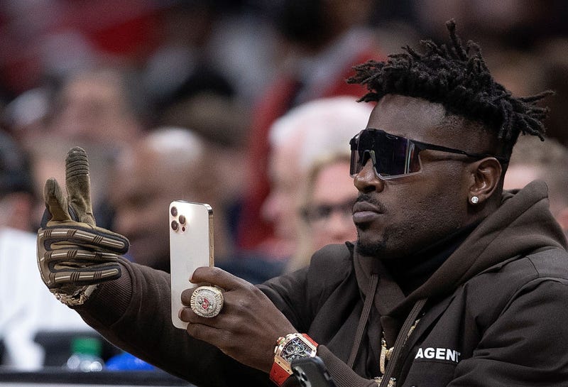 NFL player Antonio Brown looks on during the second half of the game between the Atlanta Hawks and the Los Angeles Clippers at State Farm Arena on March 11, 2022 in Atlanta, Georgia.