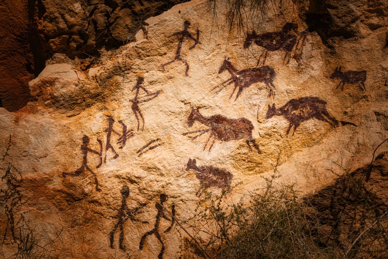 Cave art depicting early human species. 