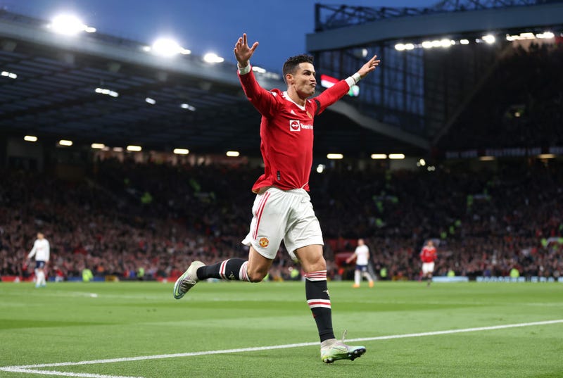 Cristiano Ronaldo of Manchester United celebrates after scoring their side's second goal during the Premier League match between Manchester United and Tottenham Hotspur at Old Trafford on March 12, 2022 in Manchester, England.
