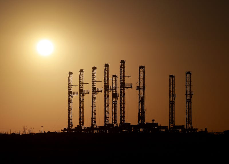 Drilling rigs sit unused on a company's lot located in the Permian Basin area on March 13, 2022, in Odessa, Texas.