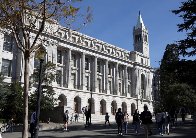 People walk by Wheeler Hall on the UC Berkeley campus on March 14, 2022 in Berkeley, California.