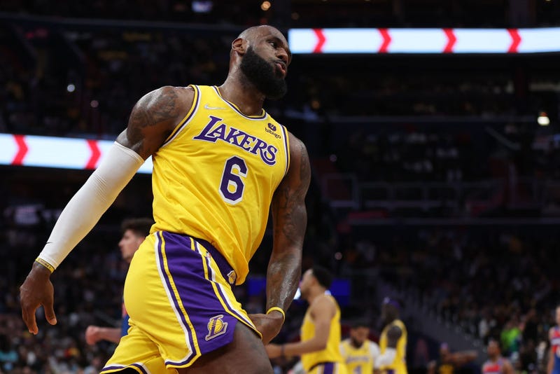 LeBron James #6 of the Los Angeles Lakers reacts after shooting a basket against the Washington Wizards during the first half at Capital One Arena on March 19, 2022, in Washington.