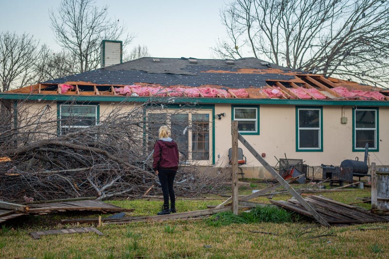 house damaged by tornado