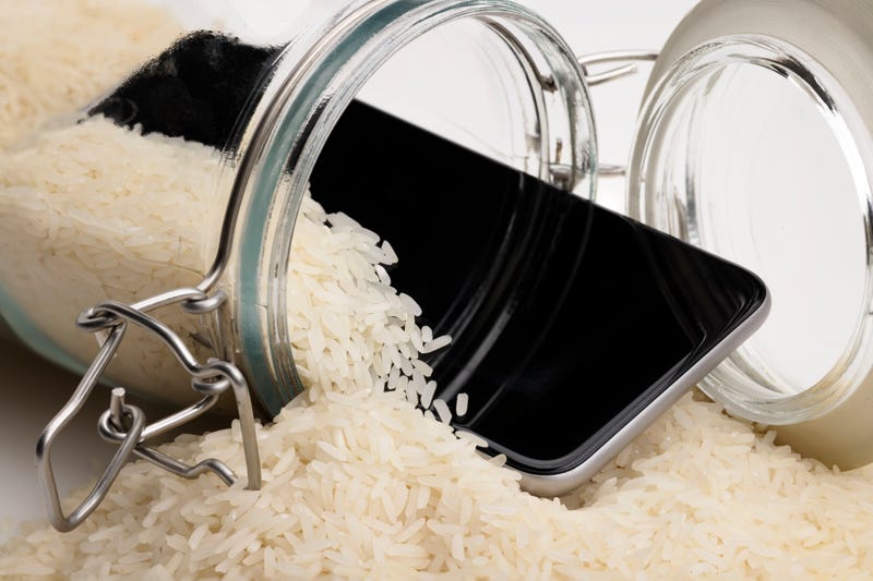 An iPhone in a jar of rice.