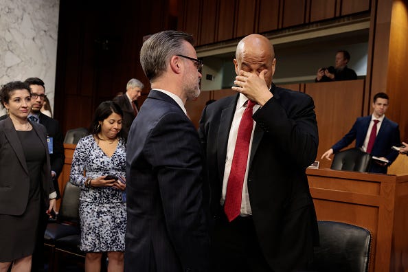Sen. Cory Booker (R) (D-NJ) and Patrick Jackson, husband of Supreme Court nominee Judge Ketanji Brown Jackson.