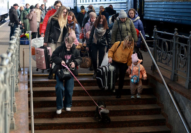 People arrive at the main train station from Zaporizhzhia on March 24, 2022 in Lviv, Ukraine. More than 3 million people have fled Ukraine, with millions more internally displaced, after Russia's large-scale invasion of the country on Feb. 24.
