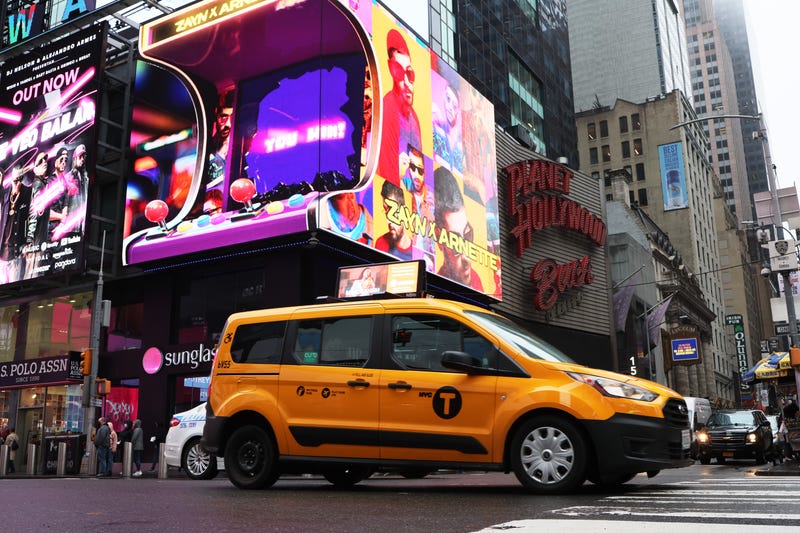 A yellow cab taxi is seen on March 24, 2022 in New York City. Uber announced that it will begin to list all New York City taxis through its app starting this spring to a limited number of users before a full roll out in the summer. Uber spokesperson Conor Ferguson said that customers will be paying roughly the same amount for taxi rides as they would for Uber X rides and that the city’s some 14,000 cabbies will be able to see what a trip will pay before they decide whether to accept it, something the Uber drivers in New York cannot do.