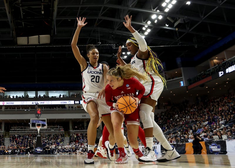 UConn's Aaliyah Edwards (#3) and Olivia Nelson-Ododa (#20) play tough defense during the third round of the NCAA Women's Basketball Tournament in Bridgeport, 3/26/22