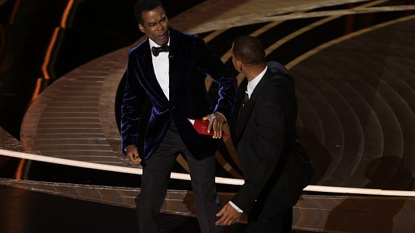 Will Smith smacks Chris Rock for making Jada Pinkett Smith joke during the Oscars