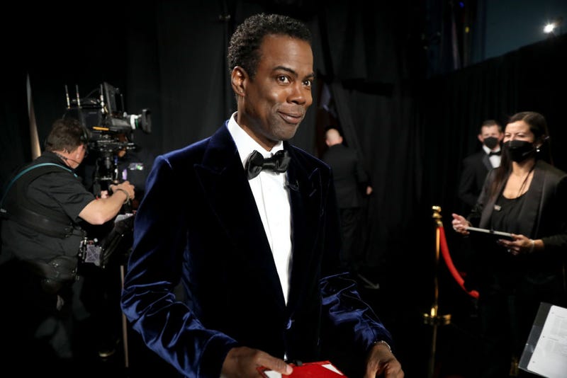 FILE - Chris Rock is seen backstage during the 94th Annual Academy Awards at Dolby Theatre on March 27, 2022 in Los Angeles.
