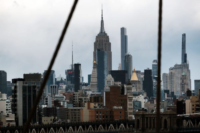 The Manhattan skyline looms over the East River on March 28, 2022 in New York City.