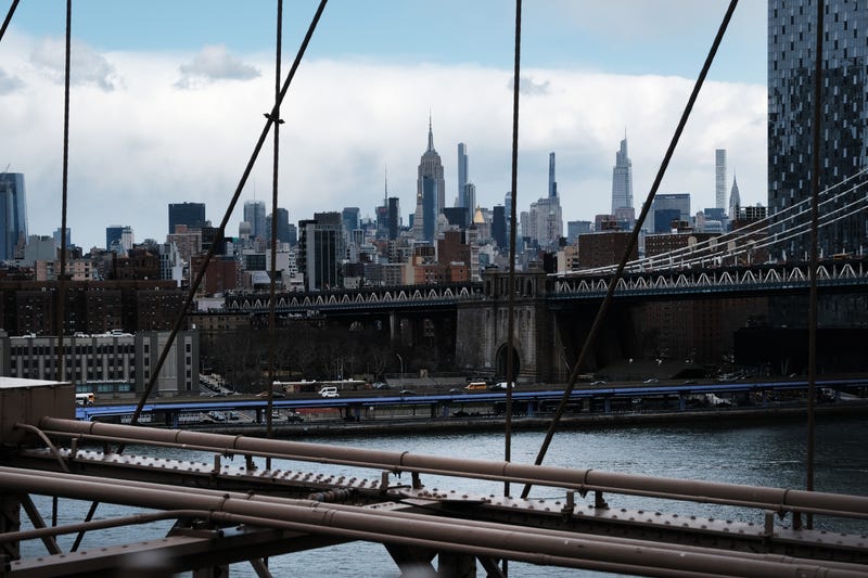 The Manhattan skyline looms over the East River on March 28, 2022 in New York City