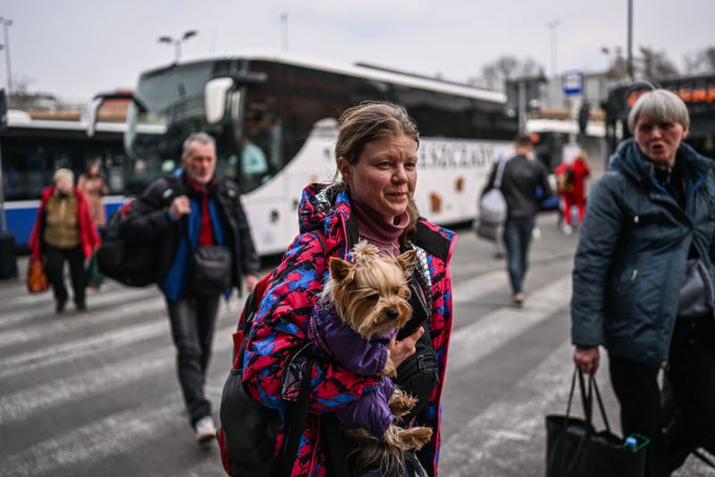 People who fled the war in Ukraine arrive from Przemysl by bus on March 29, 2022 in Krakow, Poland. The Polish government has said it may spend €24 billion this year hosting refugees fleeing the war in Ukraine, and is seeking more support from the European Union. With more than 2.2 million Ukrainian refugees, Poland is now the country with the second-largest foreign refugee population after Turkey.