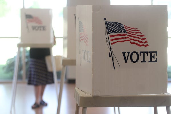 Voting booths stand ready for use in a U.S. election