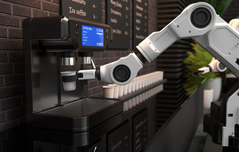 Robot arm making coffee 