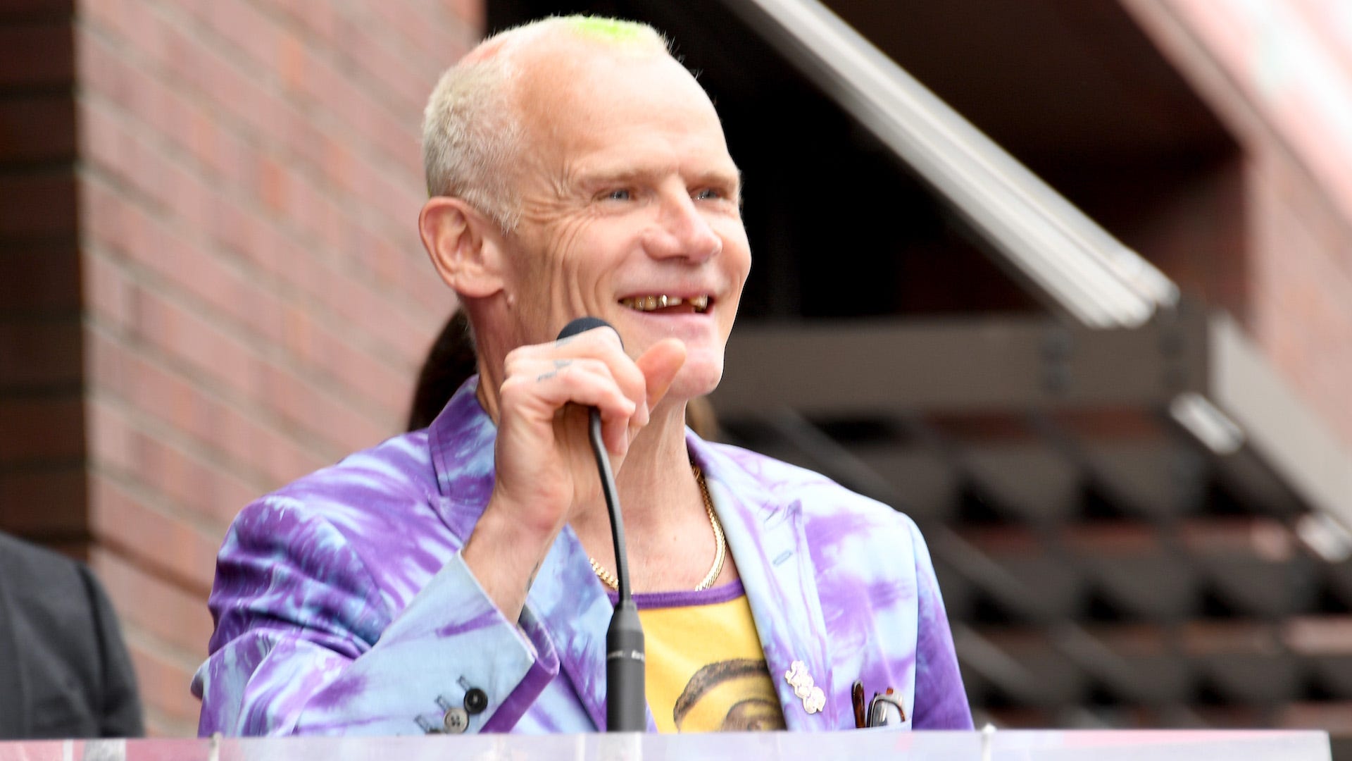 Flea’s daughter uses his GRAMMY trophy as a garden shovel