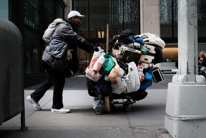 A homeless man walks through Manhattan on March 31, 2022 in New York City.