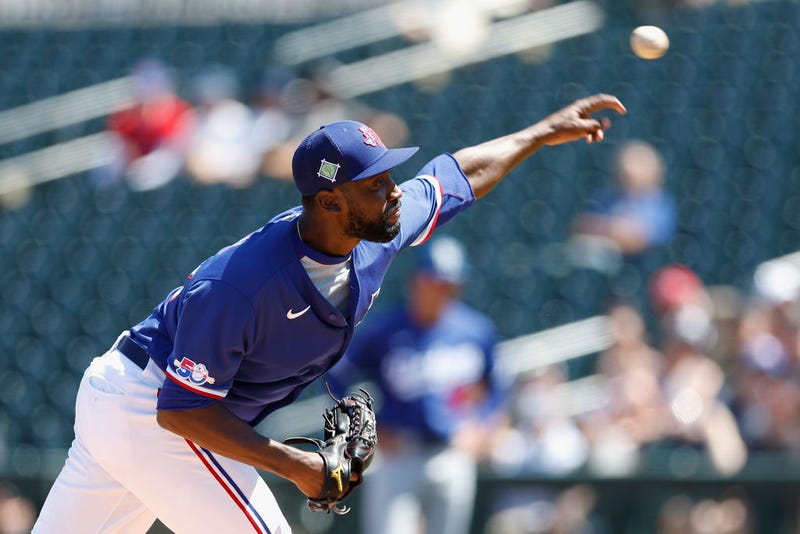 Starting pitcher Taylor Hearn #52 of the Texas Rangers pitches against the Los Angeles Dodgers during the second inning of the MLB spring training game at Surprise Stadium on March 31, 2022 in Surprise, Arizona.
