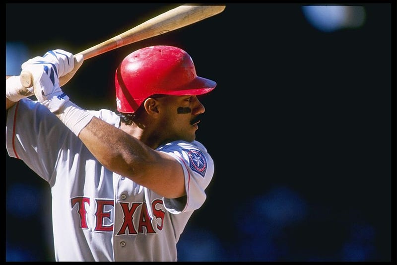 Juan Gonzalez readies for a pitch.