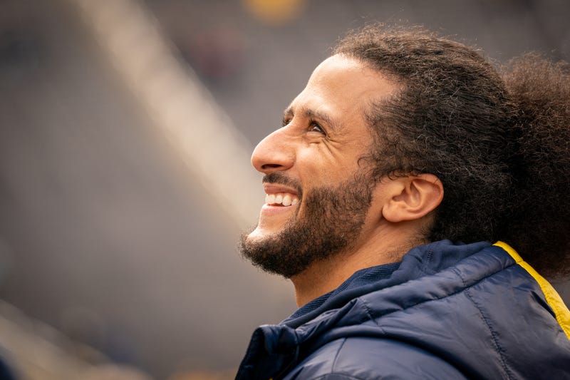 Colin Kaepernick interacts with fans during the Michigan spring football game at Michigan Stadium on April 2, 2022 in Ann Arbor, Michigan. Kaepernick was honorary captain for the game.