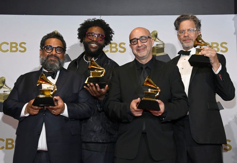 From left: Joseph Patel, Questlove, David Dinerstein and Robert Fyvolent, winners of the Best Music Film "Summer of Soul," pose during the 64th Annual Grammy Awards, April 3, 2022.