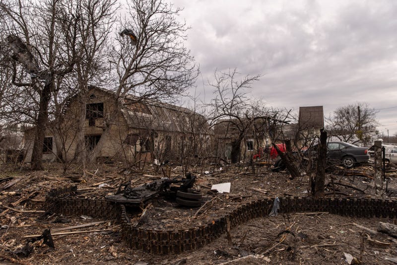 Destroyed houses and vehicles are seen on April 06, 2022 in Bucha, Ukraine.