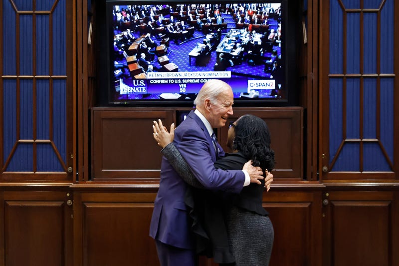 President Biden embraces Judge Ketanji Brown Jackson moments after the she got enough votes in the Senate to be confirmed as the first Black woman to be a justice on the Supreme Court.