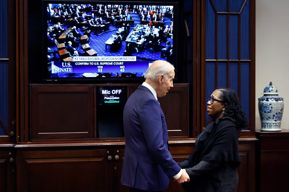 U.S. President Joe Biden congratulates Ketanji Brown Jackson moments after the U.S. Senate confirmed her to be the first Black woman to be a justice on the Supreme Court in the Roosevelt Room at the White House