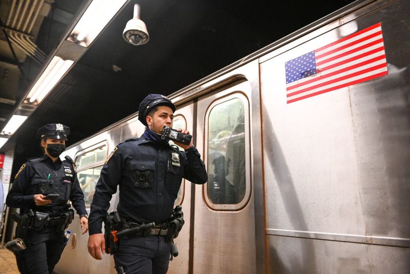 New York City police investigate an incident on an Uptown 4 subway after an emergency brake was pulled near Union Square on April 12, 2022 in New York City.