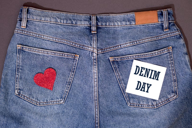 jeans with heart on pocket and card that says denim day