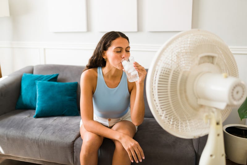 Person cooling down in extreme heat.