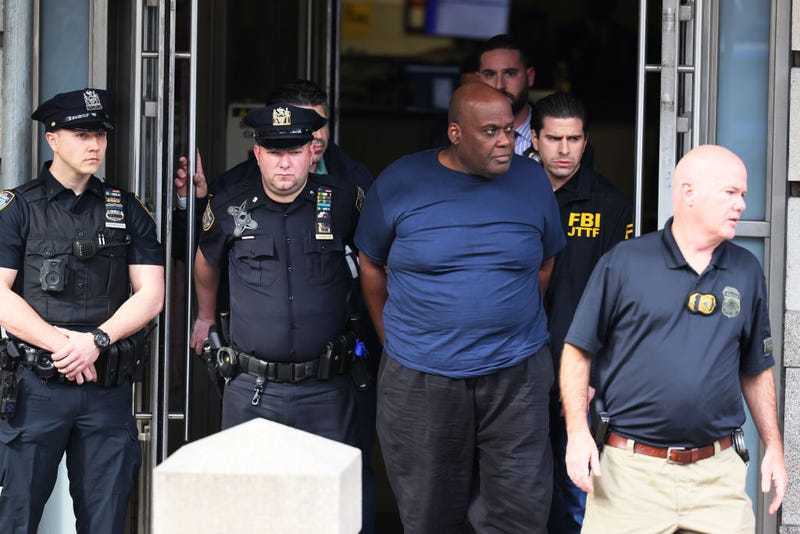 Suspect Frank James is led by police from Ninth Precinct after being arrested for his connection to the mass shooting at the 36th St subway station on April 13, 2022 in New York City.