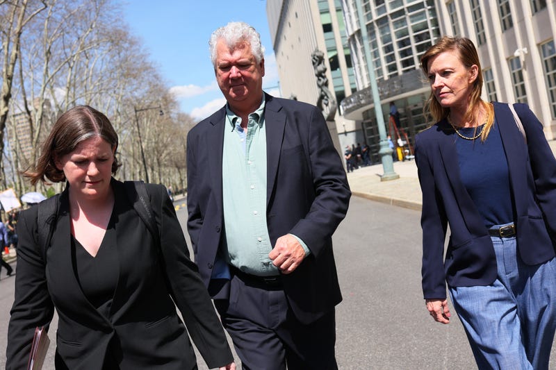 Mia Eisner-Grynberg and Deirdre von Dornum, both of Federal Defenders of New York and lawyers for mass shooting suspect Frank James, leave after speaking with members of the media following a brief proceeding in Brooklyn federal court on April 14, 2022