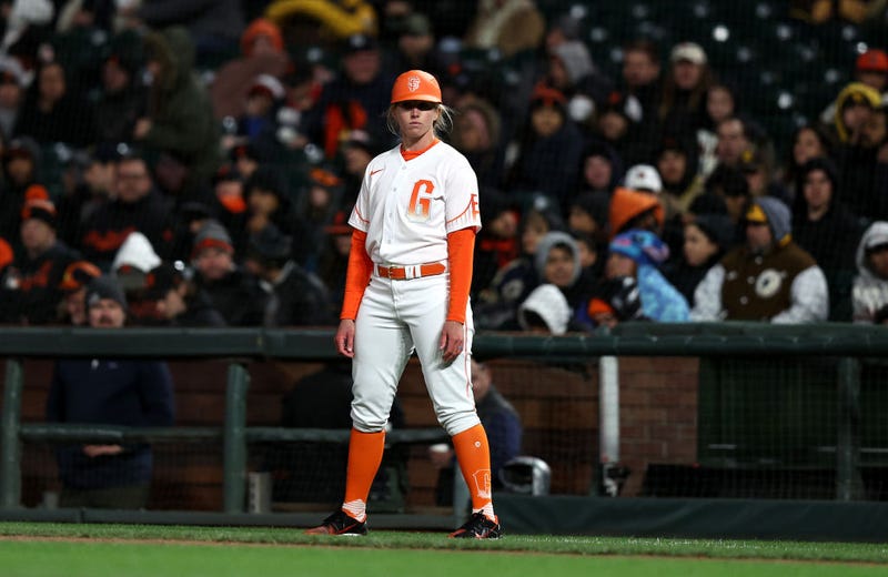 Alyssa Nakken coaches first base for the San Francisco Giants during their game against the San Diego Padres at Oracle Park on April 12, 2022 in San Francisco, California.