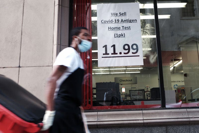 PHILADELPHIA, PENNSYLVANIA - APRIL 14: A sign in a window advertises Covid-19 test kits for sale in downtown Philadelphia on April 14, 2022 in Philadelphia, Pennsylvania.