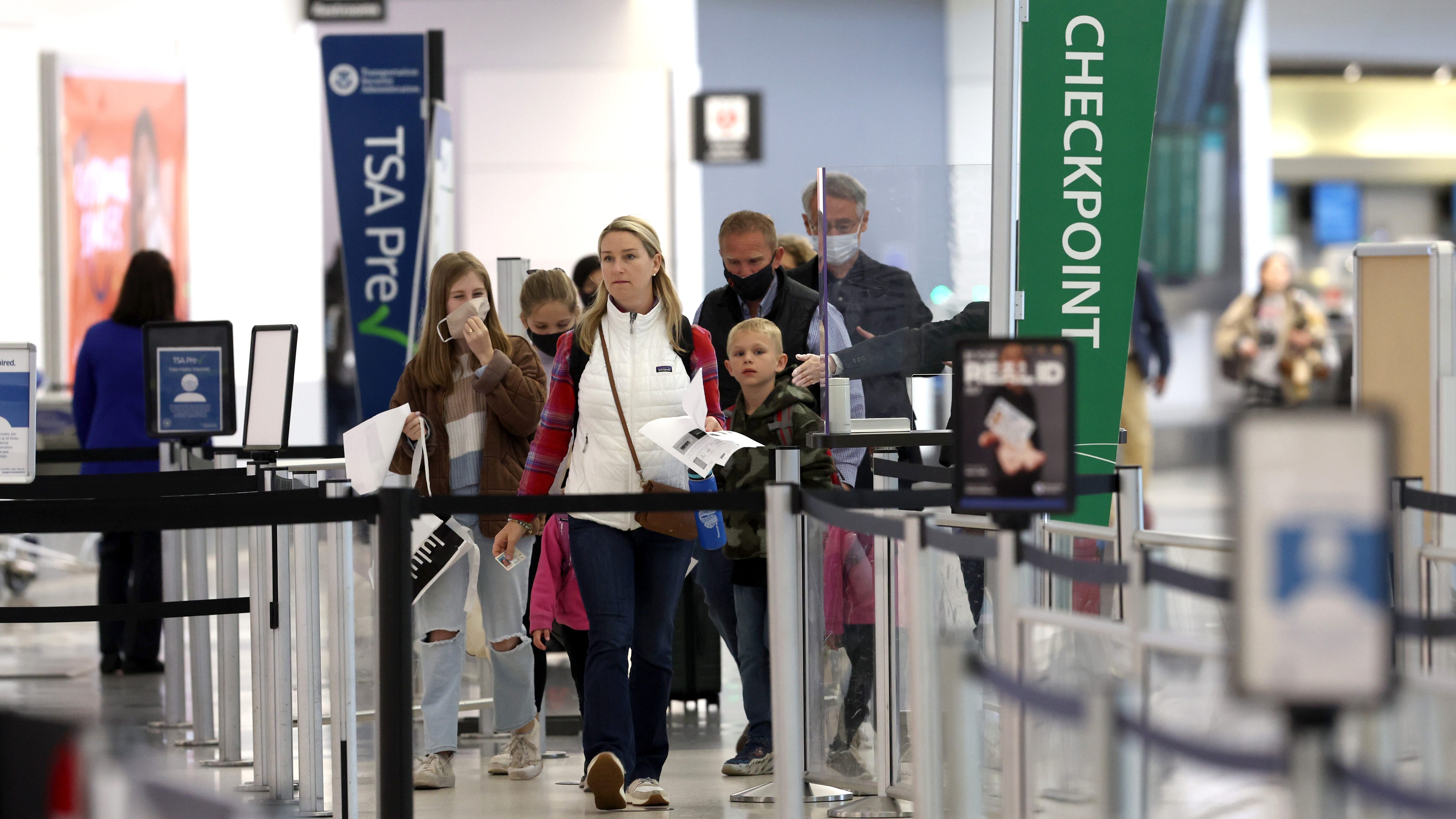 Majority of Americans want to keep masks on while traveling