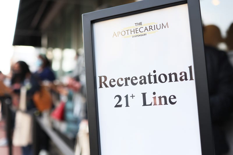 People wait in line to enter Apothecarium Dispensary on April 21, 2022 in Maplewood, New Jersey. Today marked the first day of legal recreational marijuana sales in the state of New Jersey.