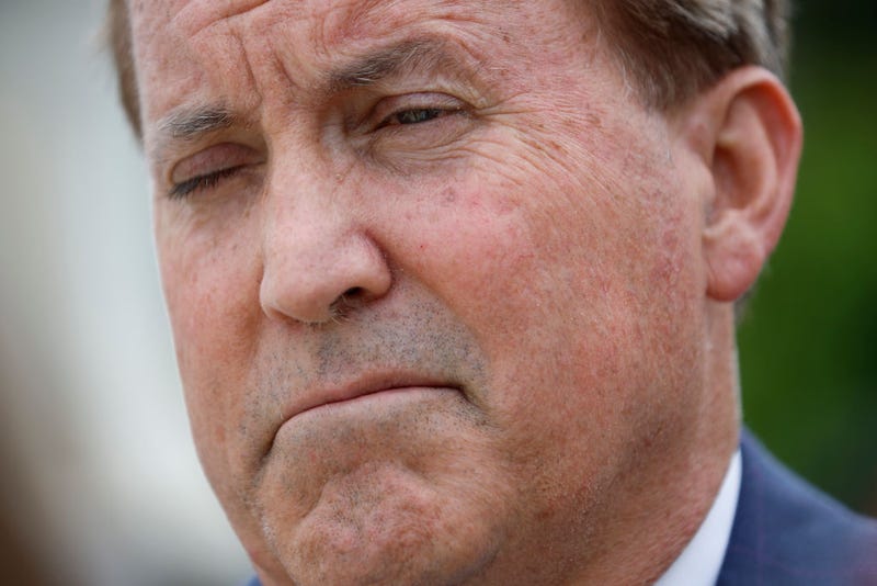 Texas Attorney General Ken Paxton talks to reporters after the U.S. Supreme Court heard arguments in a case Texas brought against the Biden Administration about Title 42 on April 26, 2022 in Washington, DC. Paxton and Schmitt, who is running for the U.S. Senate in Missouri, are suing to challenge the the Biden Administration's repeal of the Trump Migrant Protection Protocols—aka “Remain in Mexico.” (Photo by Chip Somodevilla/Getty Images)